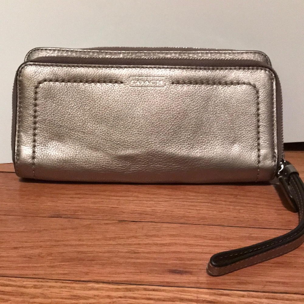 Large silver accordion style Coach wallet
